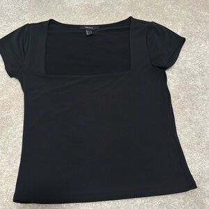 Forever 21 women’s black top. Used. Size Large but fits like a Medium.